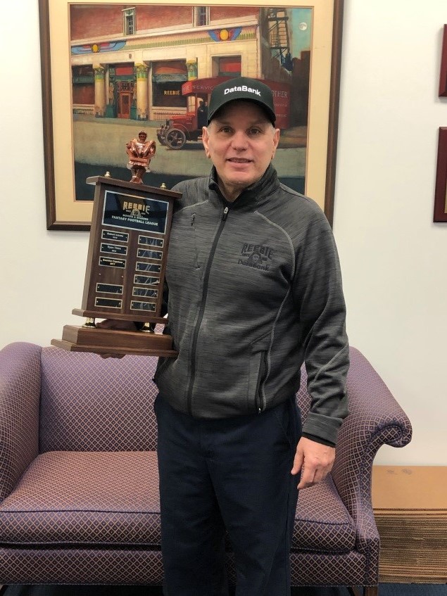 Anthony Antonelli with the Fantasy Football League trophy